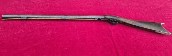A rare American under-hammer percussion KENTUCKY long-rifle with patch-box.  Circa 1840. Ref 3917.